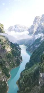 Breathtaking mountain river scene with lush greenery and misty atmosphere.