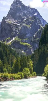 Mountain scene with river and rainbow wallpaper.