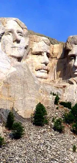 Mount Rushmore mobile wallpaper showing carved presidential faces in daylight.