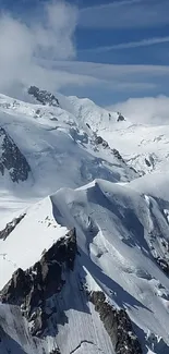 Snowy mountain peaks under a clear blue sky.