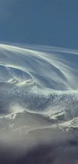 Snowy mountain range under blue sky wallpaper.