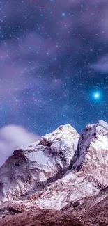 Snow-capped mountains under a starry night sky with a purple hue.