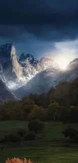 Mountain range at sunrise with lush green pastures.