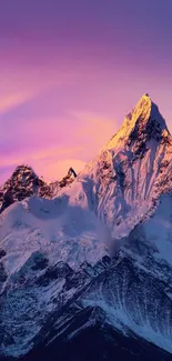 Majestic mountain at sunset with vibrant purple sky.