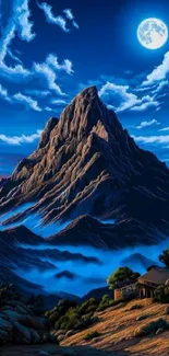 Majestic mountain landscape under a bright moonlit sky.