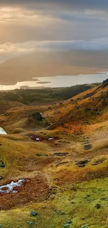 A stunning view of a golden brown mountain landscape under a soft morning light.