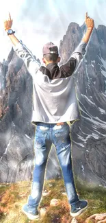 Person celebrating in stunning mountain scenery with raised arms.