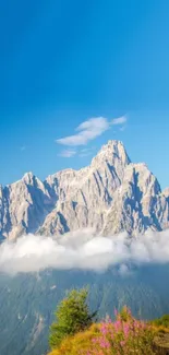 Majestic mountain with blue sky and fluffy clouds.