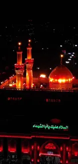 Illuminated mosque beautifully lit at night.