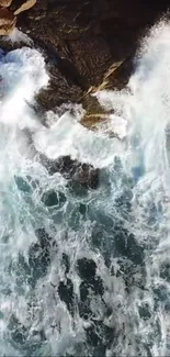 Aerial view of waves crashing against rocks.