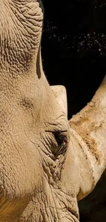 Close-up of a rhino's face in beige tones, perfect for mobile wallpaper.