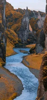 A serene river flows through a majestic canyon landscape, showcasing natural elegance.