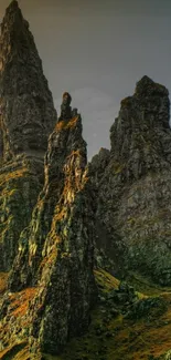 Majestic rock formations under a vibrant sky landscape.