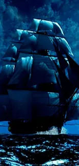 Majestic sailing ship under a midnight blue sky.