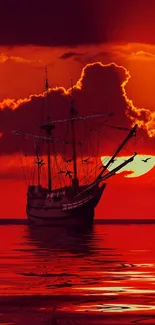 Majestic ship sails into vibrant sunset over reflective ocean waters.