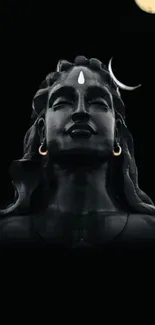 Majestic black Shiva statue with moon.