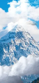 Breathtaking snowy mountain with clouds and blue sky in a serene wallpaper.