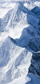 Snowy mountain peaks with clouds in a stunning mobile wallpaper.