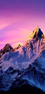 Majestic mountain peaks under a vibrant sunset sky.