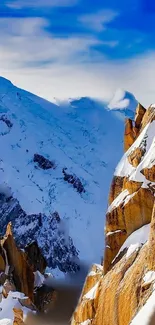 Breathtaking snowy mountain peaks under a bright blue sky.