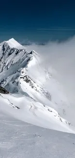 Snow-covered mountain peaks with clear skies.