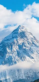 Stunning snowy mountain range under a bright blue sky.