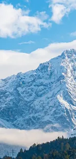 Snowy mountain peak under bright blue sky.