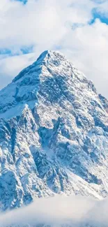 Snow-capped mountain peak under a bright blue sky, perfect for mobile wallpaper.