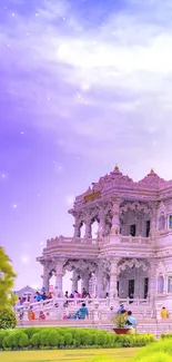 Majestic temple under a vibrant purple sunset sky.