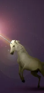 Majestic unicorn with glowing horn in starry night on mobile wallpaper.