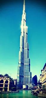 Mobile wallpaper of Burj Khalifa under a cyan sky.