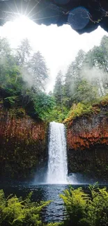 Majestic waterfall and lush greenery inside a natural cave.