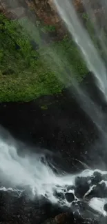 A stunning waterfall cascading through lush greenery.