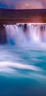 Beautiful waterfall with vibrant blue hues and scenic background.