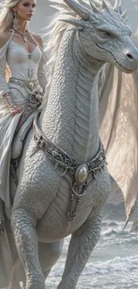 White dragon with a rider by the ocean in fantasy art.