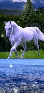 Majestic white horse in lush field with blue water.