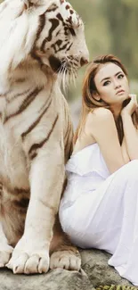 White tiger with serene woman in natural setting mobile wallpaper.