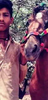 Man standing with a brown horse.