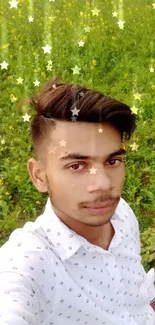 Young man taking a selfie in a lush green field with yellow flowers.