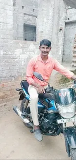 Man on a bike in a rustic, unfinished building setting.