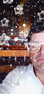 Man with glasses beneath star overlay indoors.