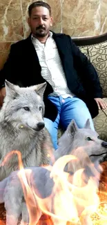 Man seated with two realistic wolves in a living room setting wallpaper.