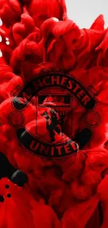 Manchester United emblem with red and black swirls.