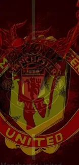 Manchester United emblem on red wallpaper.