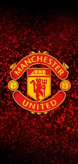 Manchester United crest wallpaper with red background.