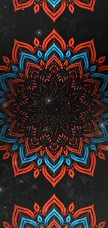 Red and blue mandala pattern on black background.