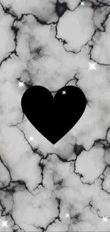 Black heart on a marble background mobile wallpaper.