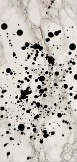 White marble background with black ink splatters.