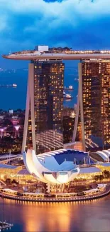 Marina Bay Sands illuminated at night in Singapore cityscape.