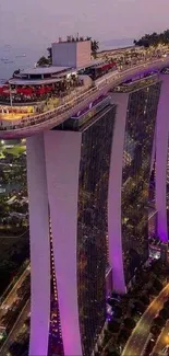 Evening view of Marina Bay Sands with vibrant twilight hues and city lights.